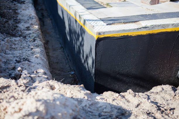Professional Interior Drainage System technician working in Georgetown, IN